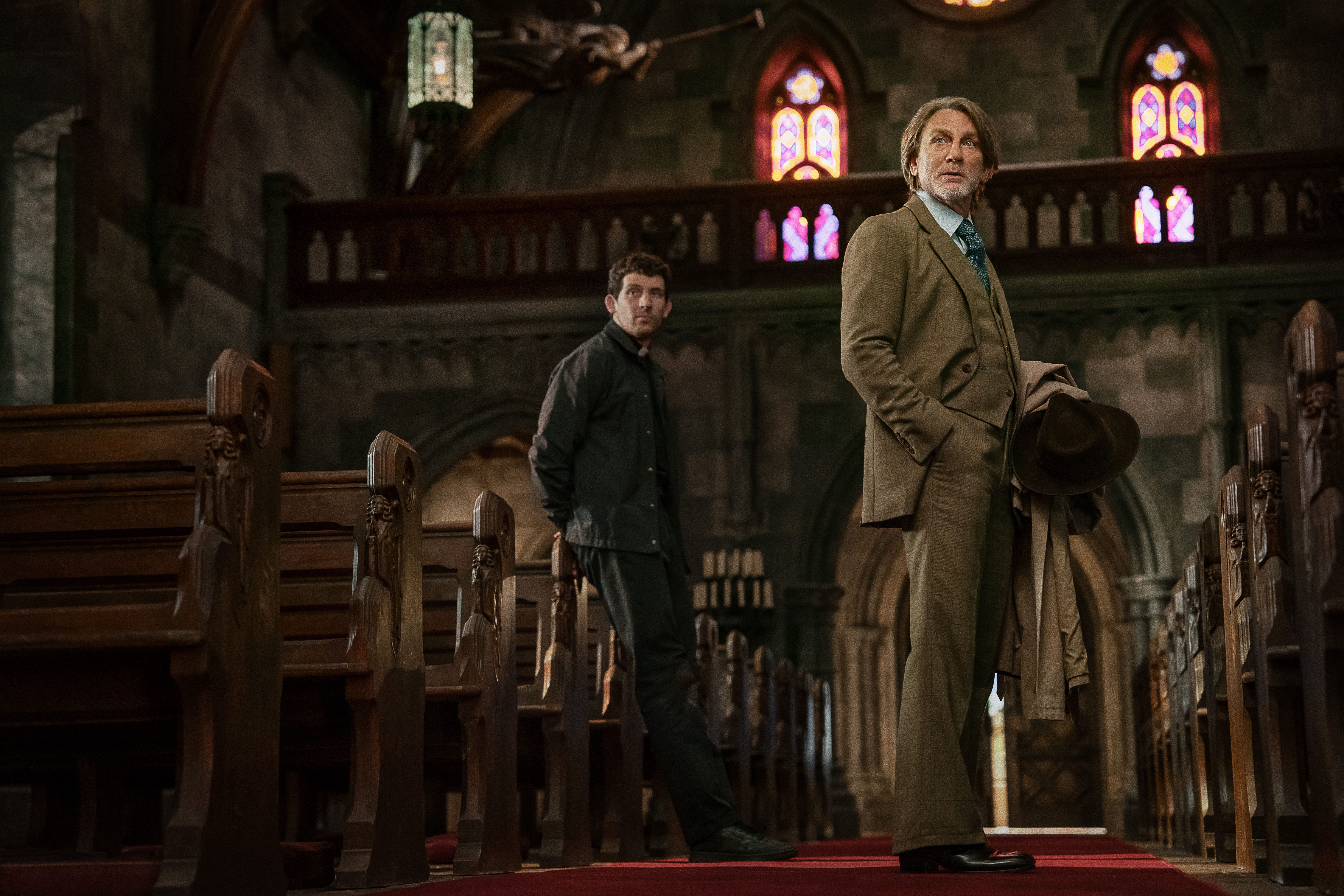Daniel Craig and Josh O&rsquo;Connor in a church in Wake Up Dead Man