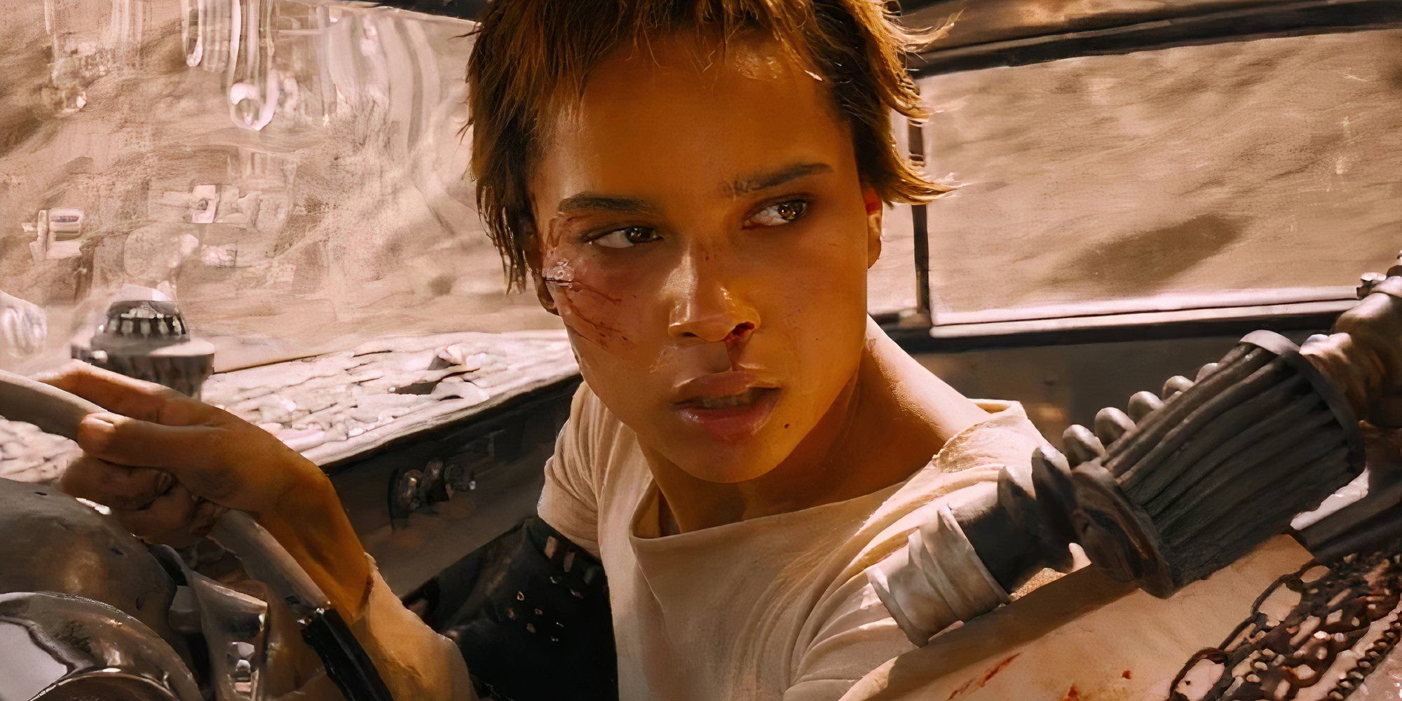 Zoe Kravitz as Toast in Mad Max Fury Road looking back.