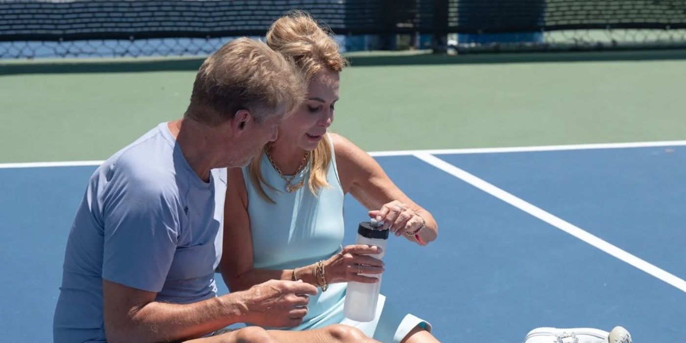 April Kirkwood and Gerry Turner sitting on a Pickleball court in The Golden Bachelor.