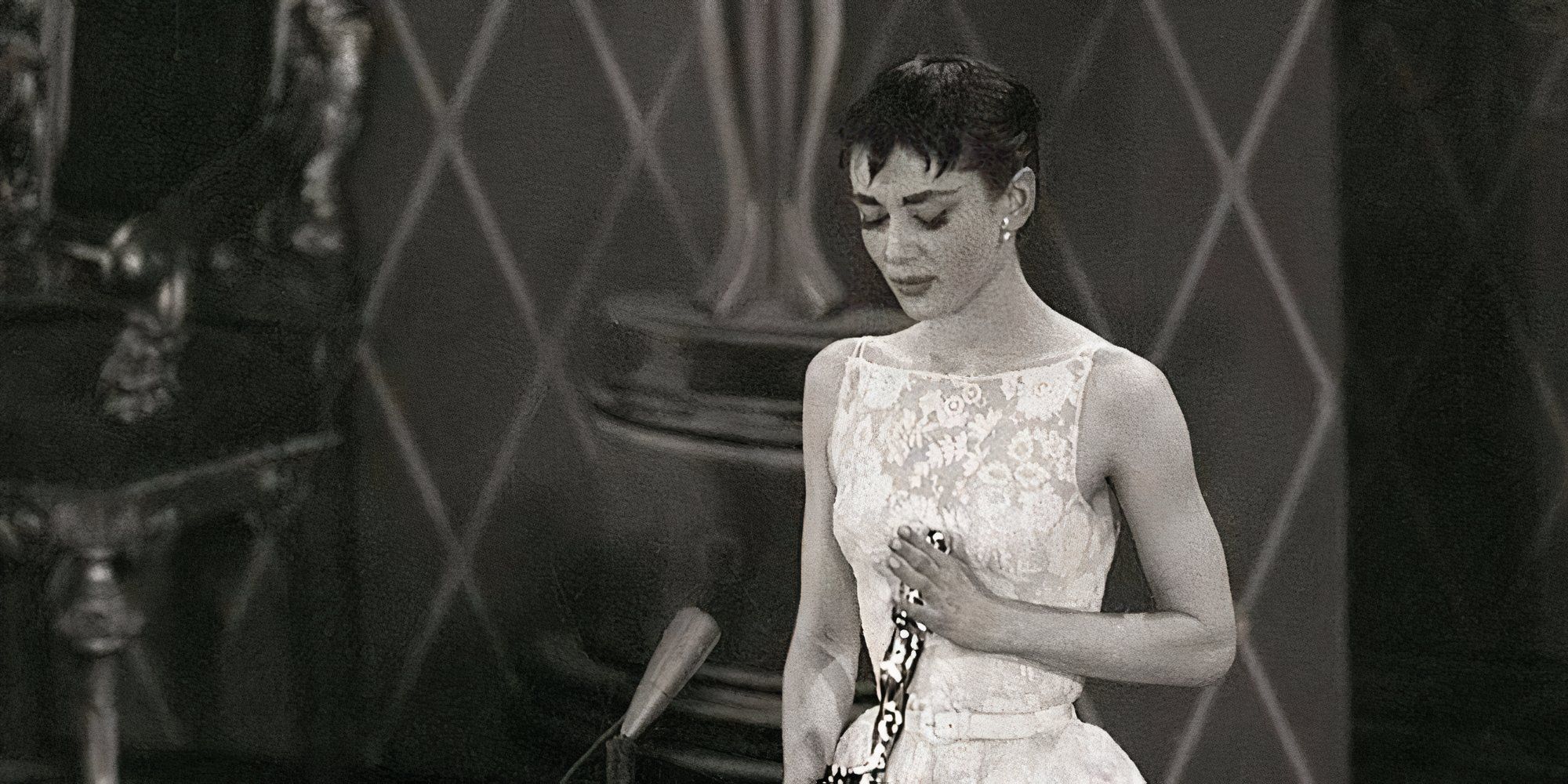 Audrey Hepburn at the 1954 Academy Awards wearing Givenchy accepting her Oscar