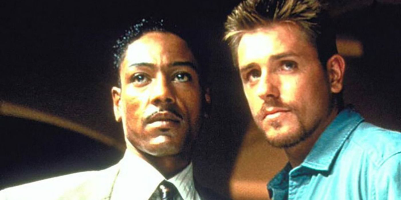 Two men look up at something with serious faces in Bakersfield P.D.