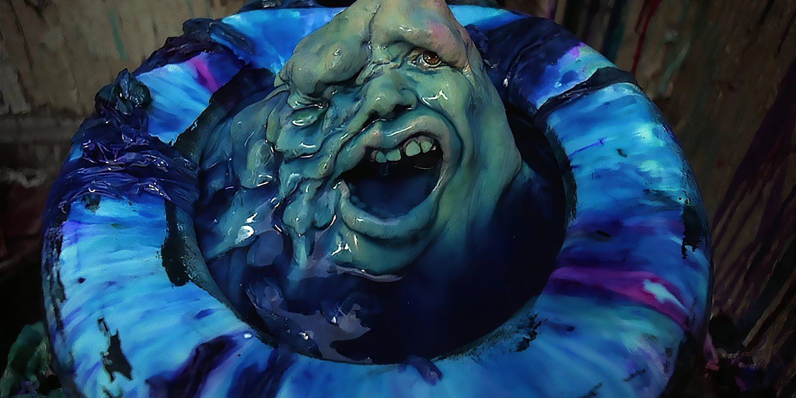 A man melts into a toilet in Street Trash.