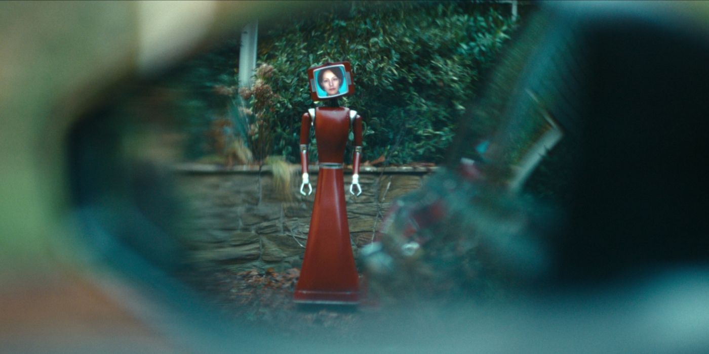 Cassandra the robot staring through a car window in Cassandra