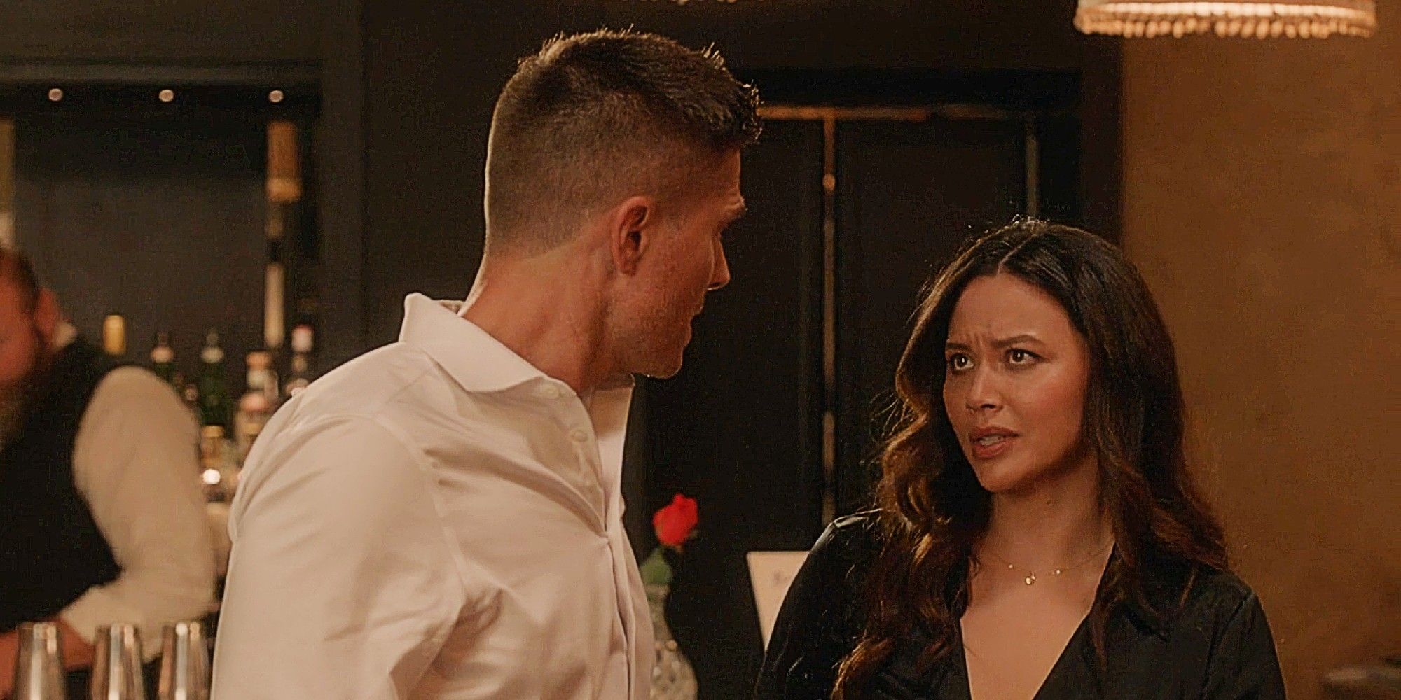 Tim Bradford and Lucy Chen talking to each other during the police gala in The Rookie