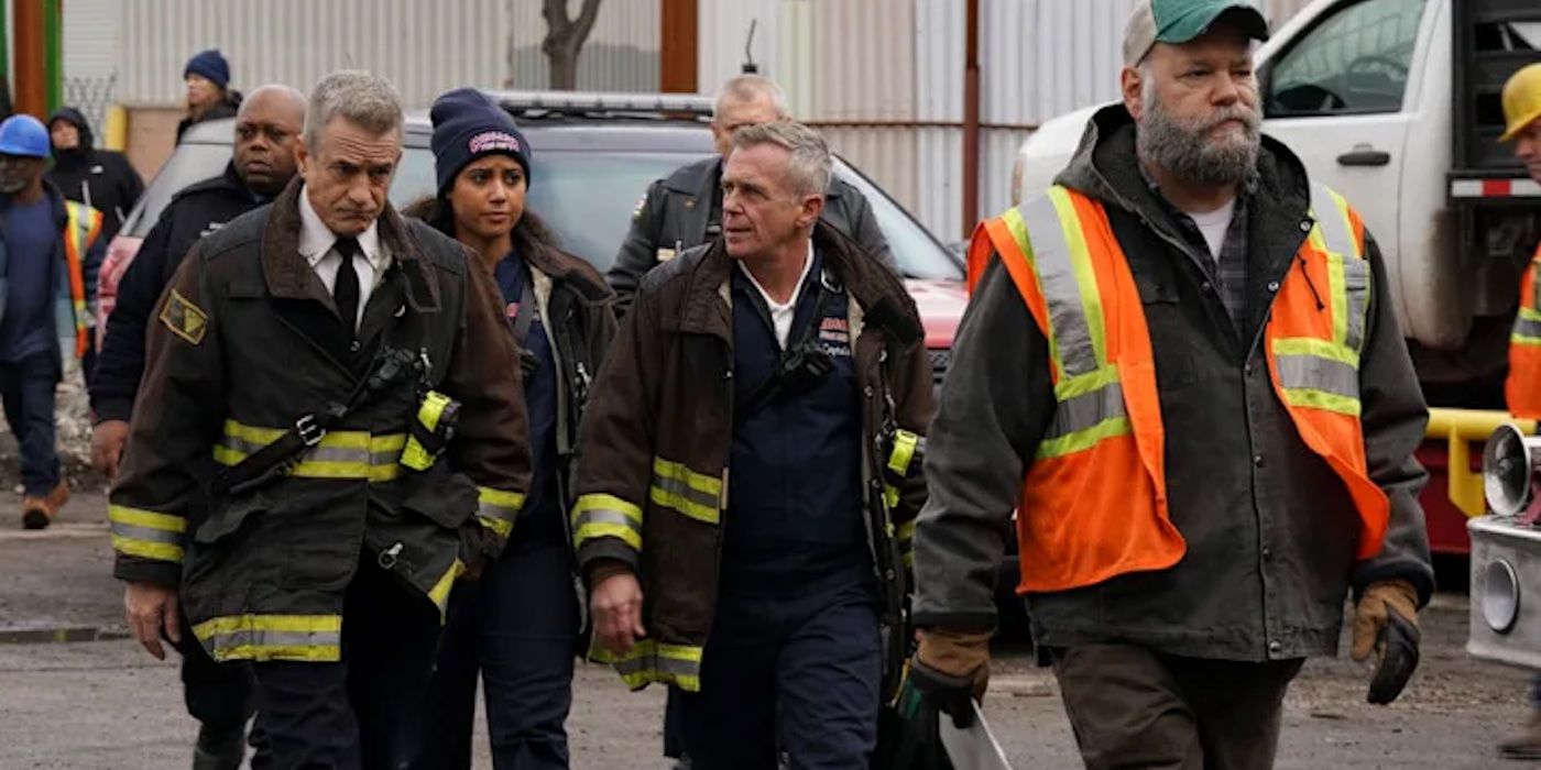 Chief Dom Pascal (Dermot Mulroney), Kylie Estevez (Katelynn Shennett) and Christopher Herrmann (David Eigenberg) follow Eddie (Brian Keane) in the scrapyard in Chicago Fire's "Relief Cut"