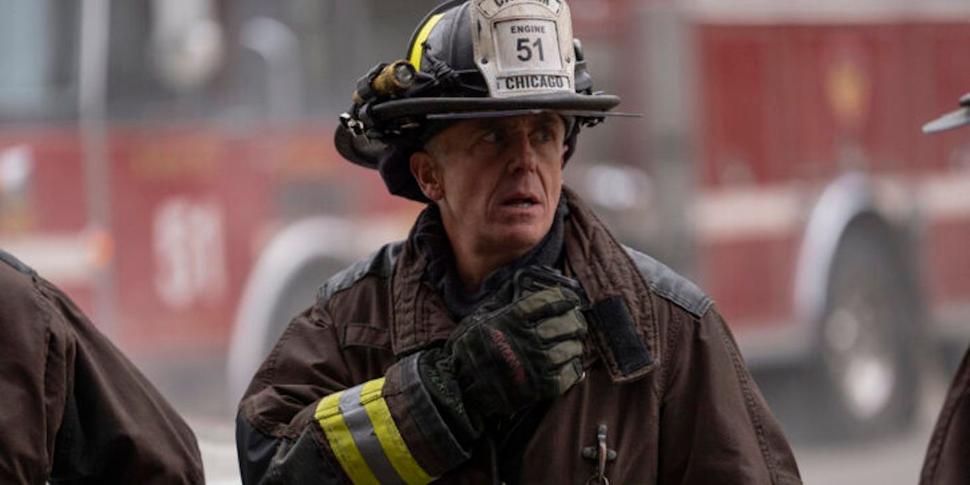 Christopher Herrmann (David Eigenberg), in fire gear, on scene in Chicago Fire