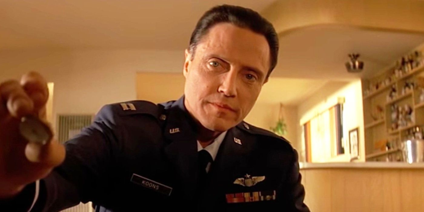 Christopher Walken holds a golden watch in a scene of Pulp Fiction