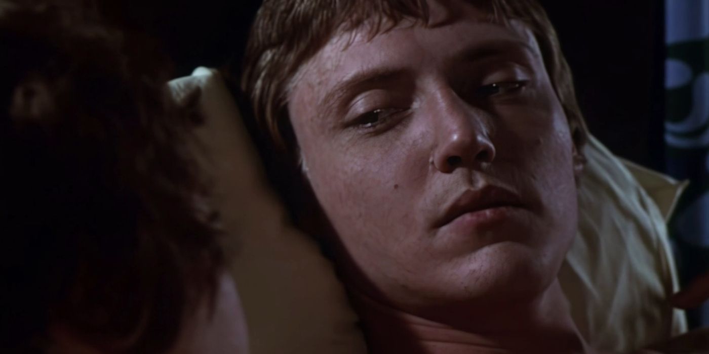 Pvt. Reese (Christopher Walken) looks at a woman next to him in bed in The Mind Snatchers / The Happiness Cage