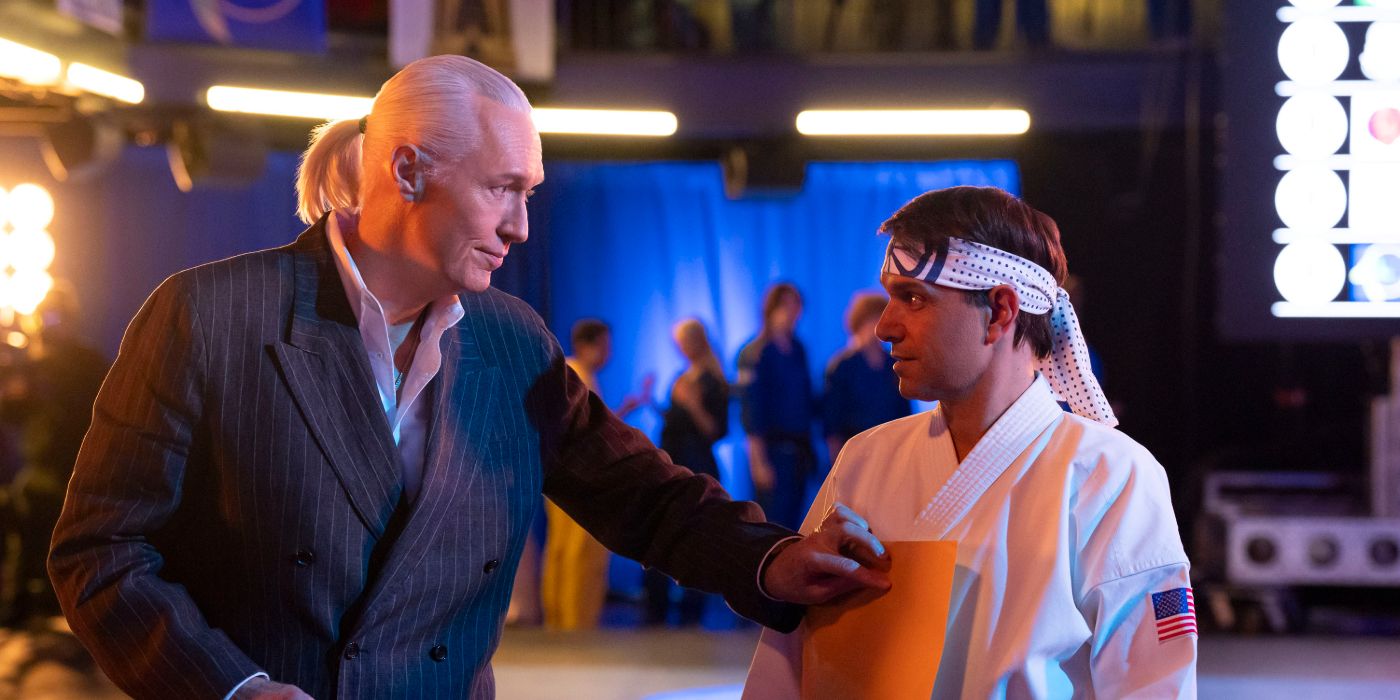 Ralph Macchio as Danie LaRusso talking to Thomas Ian Griffith as Terry Silver in Cobra Kai Season 6.