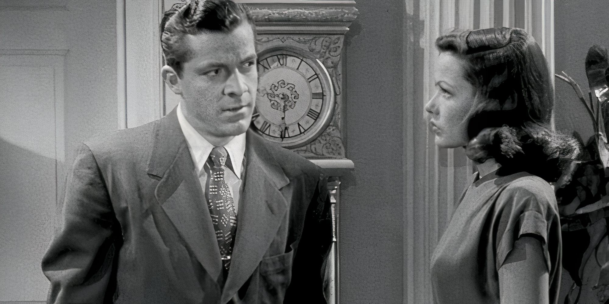 Dana Andrews and Gene Tierney looking at each other in Laura (1944)