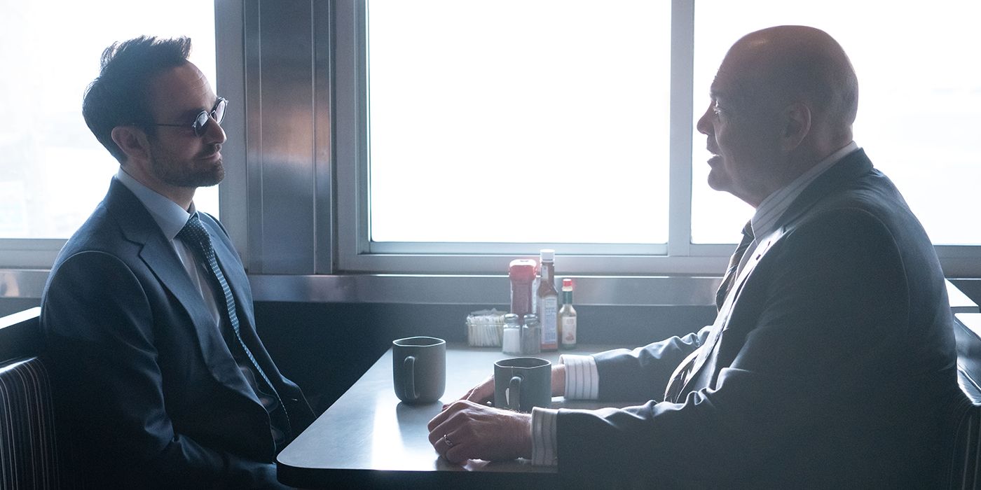 Charlie Cox as Matt Murdock talking to Vincent D'Onofrio as Wilson Fisk in a diner in Daredevil: Born Again