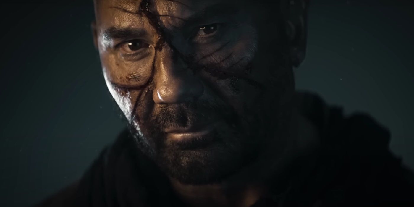 Dave Bautista, frowning, as Boyce in In the Lost Lands