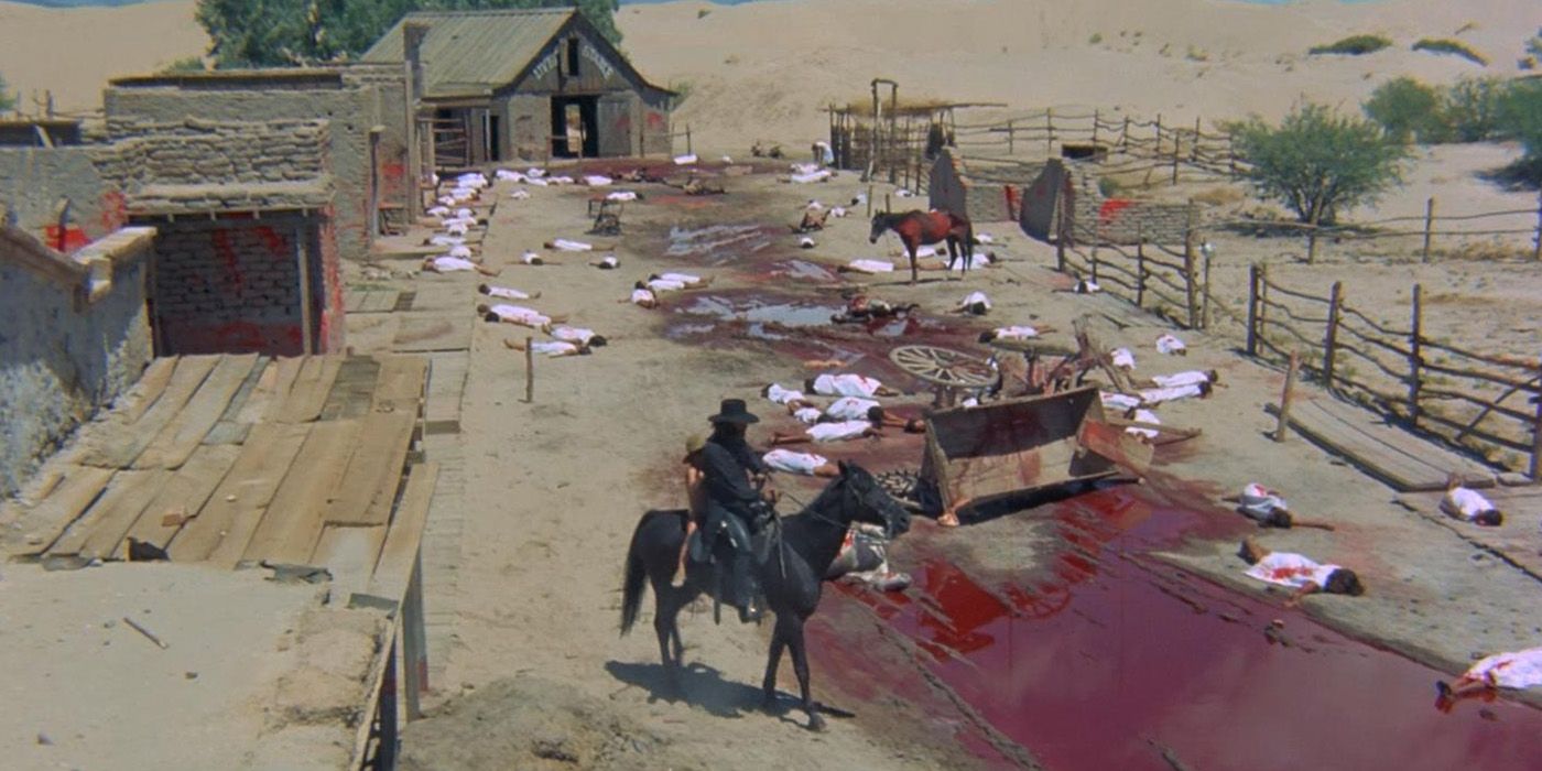 Alejandro Jodorowsky rides through a bloody town in El Topo