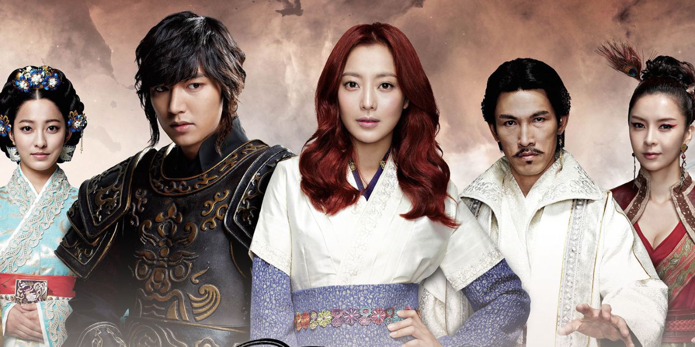 Lee Min-ho and the rest of the main cast of Faith posing as their characters against a smokey backdrop.