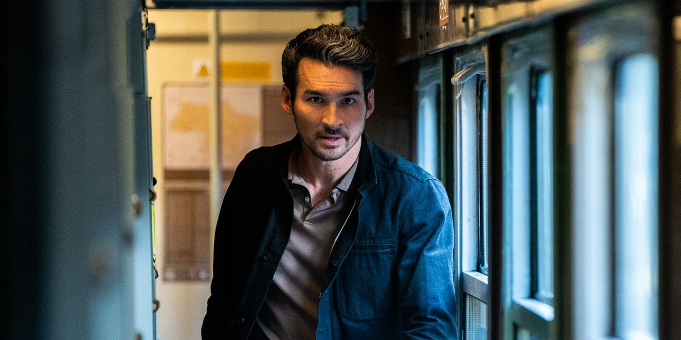 Jay Hayden as Agent Tyler Booth in FBI International Season 4 Episode 10