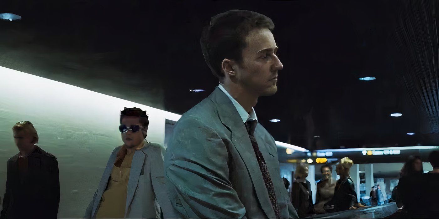 Edward Norton as The Narrator looking out into the distance while Tyler stands behind him in Fight Club