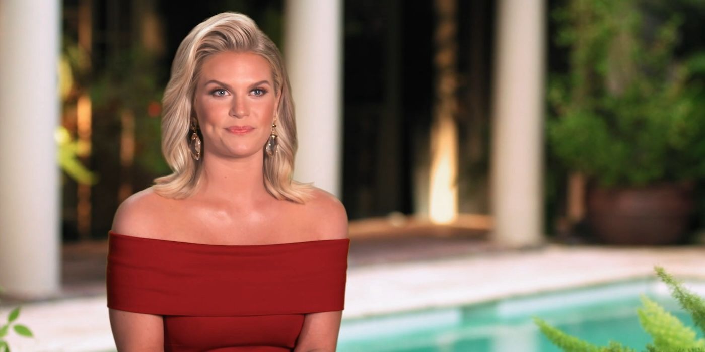 Madison LeCroy in a red off-the-shoulder dress in a confessional interview for &lsquo;Southern Charm&rsquo;.