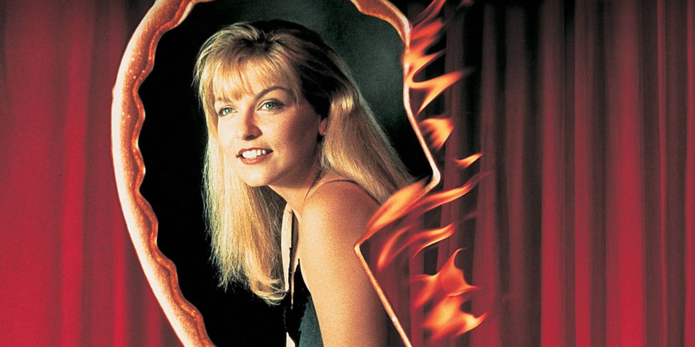 laura palmer looks through a burning hold in Twin Peaks: Fire Walk with Me