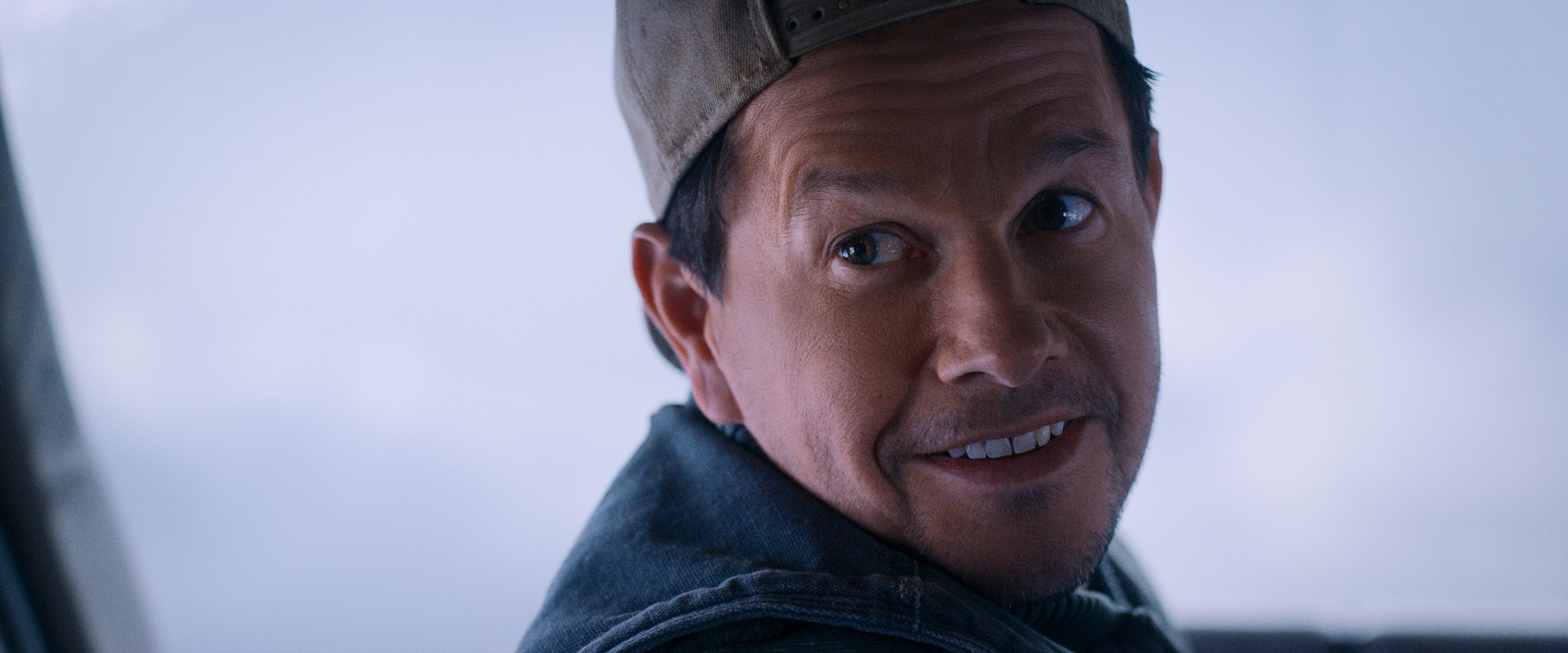 Mark Wahlberg wearing a hat in Flight Risk