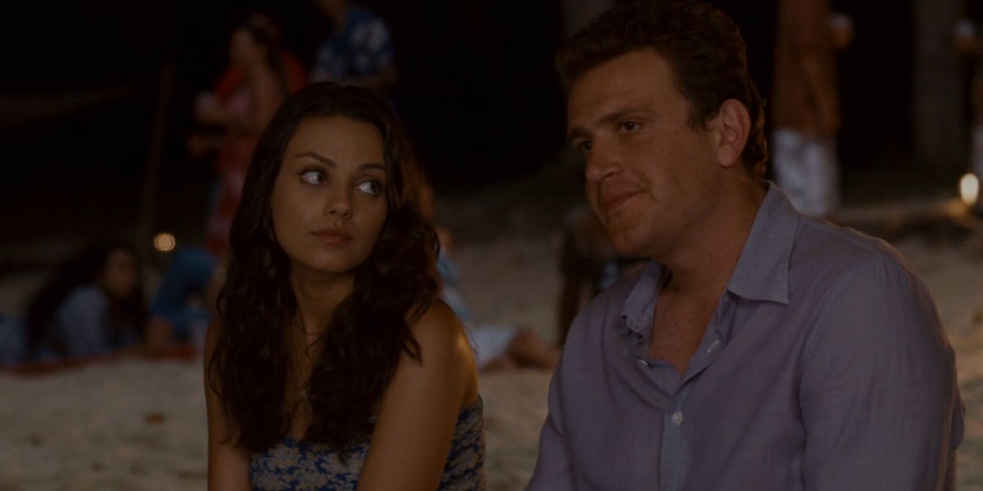 Rachel Jansen (Mila Kunis) sits with Peter Bretter (Jason Segel) in 'Forgetting Sarah Marshall'.