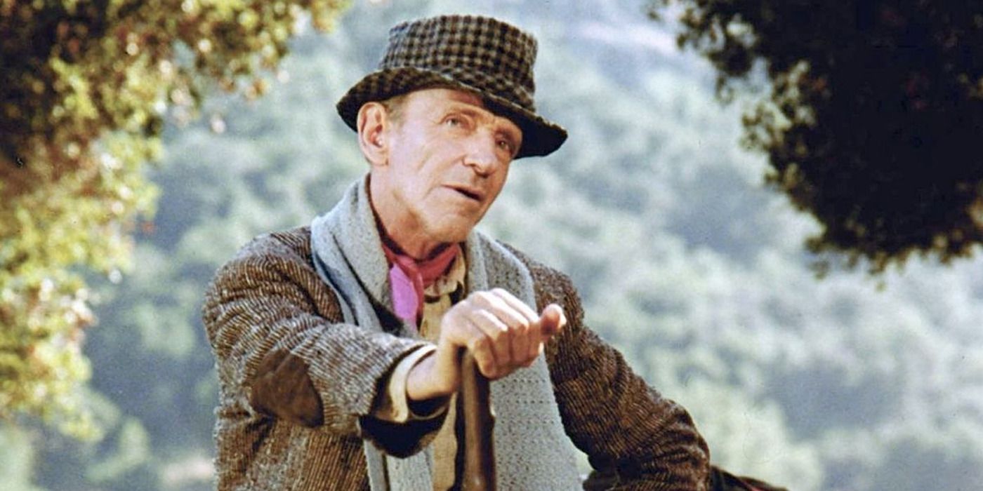 Fred Astaire in Finian&rsquo;s Rainbow, in a forest with a cane.