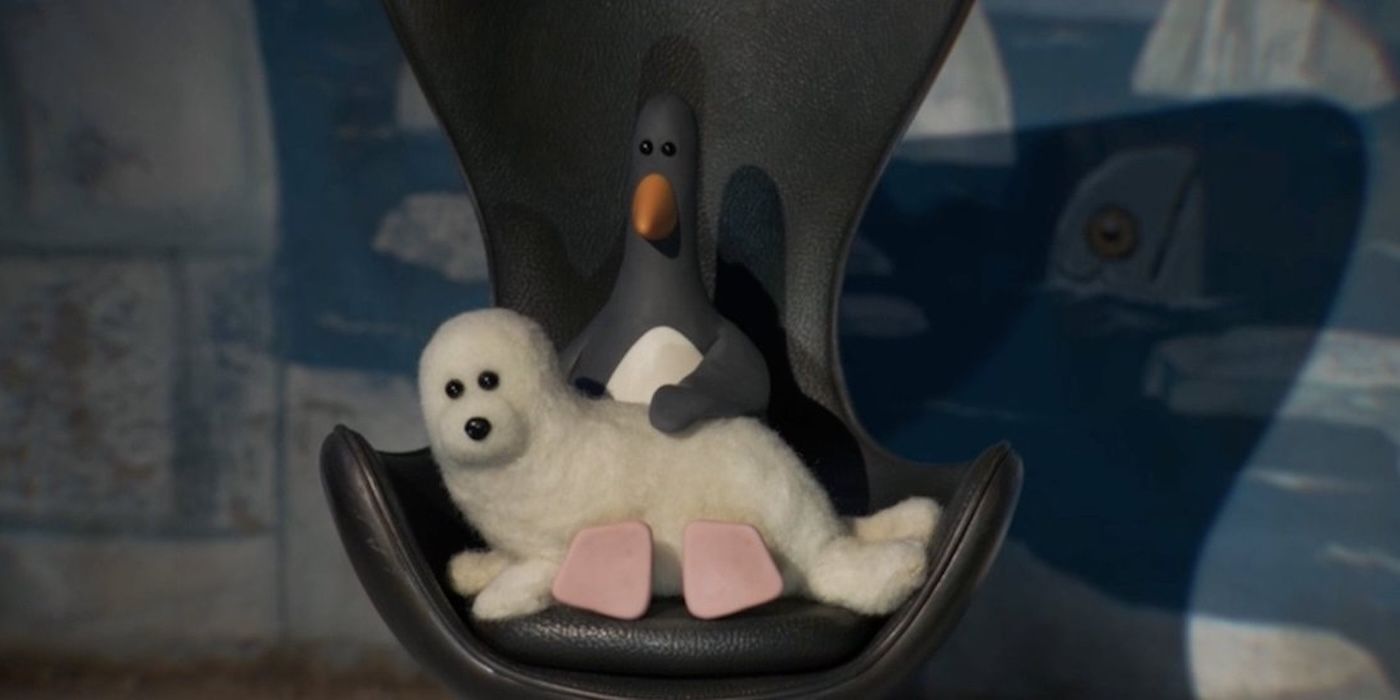 Feathers McGraw with a baby seal on his lap in Wallace &amp; Gromit: Vengeance Most Fowl