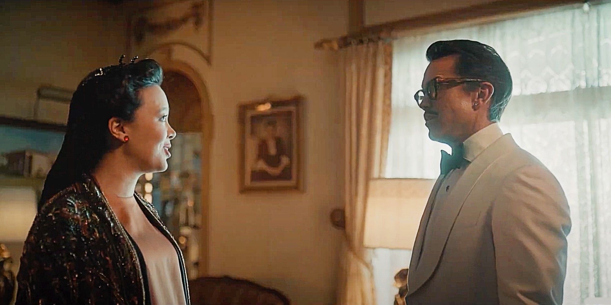 Poppy Li and Ian Grimm having a conversation while at the murder mystery party in Mythic Quest Season 4