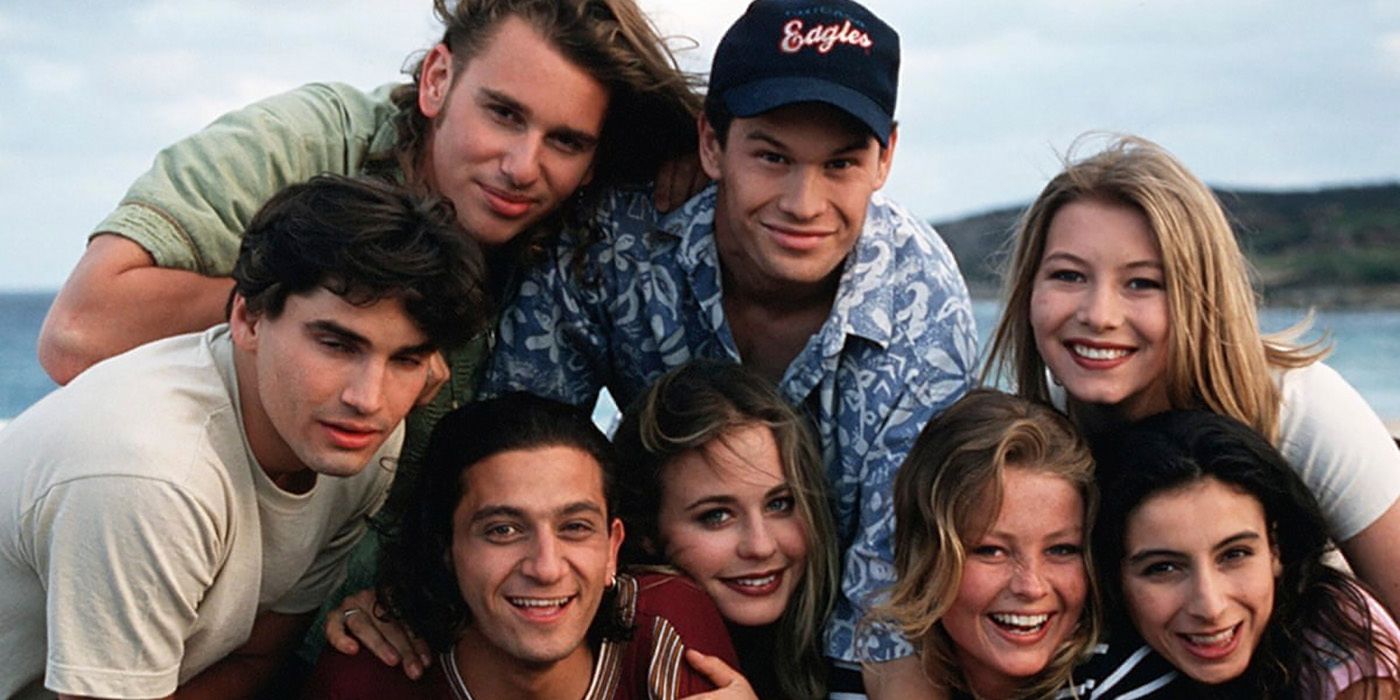 The cast of the original Australian series Heartbreak high posing and smiling.
