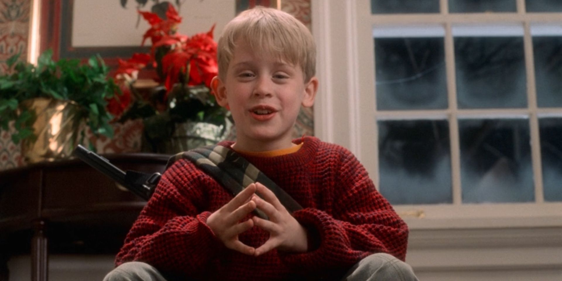 Kevin McCallister, played by Macaulay Culkin, presses his fingertips together in &lsquo;Home Alone&rsquo;.