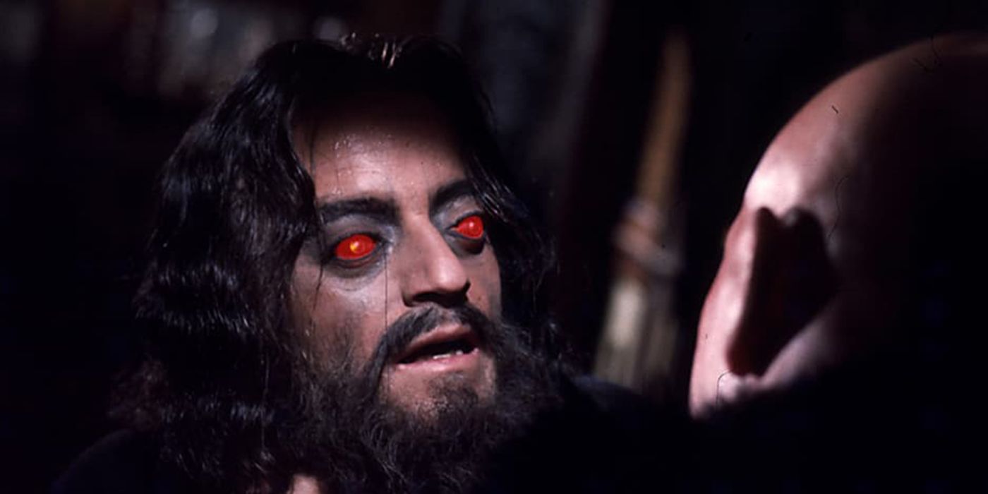 Father Pujardov (Alberto de Mendoza) with glowing red eyes in Horror Express