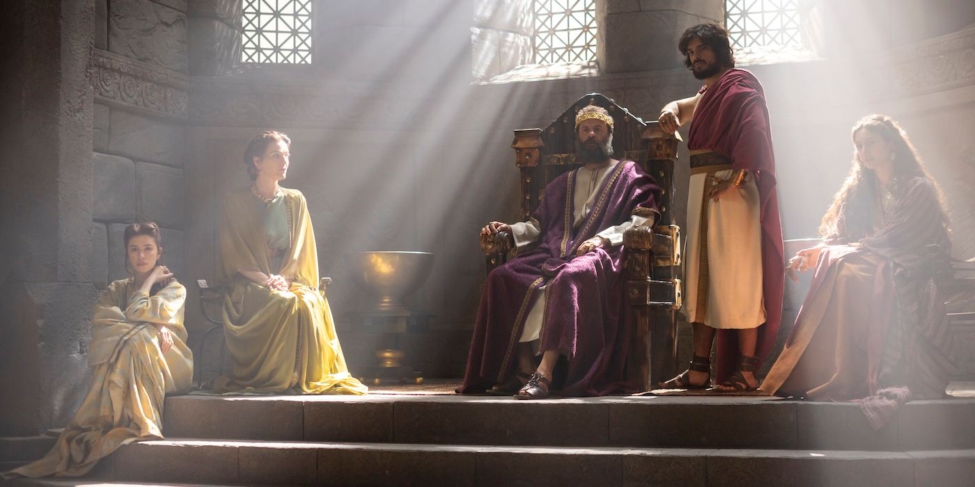 King Saul (Ali Suliman) on his throne, joined by his son Jonathan (Ethan Kai) and some women, on 'House of David'