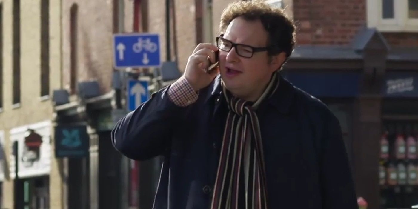 Ian Midlane taking a phone call in Doctors