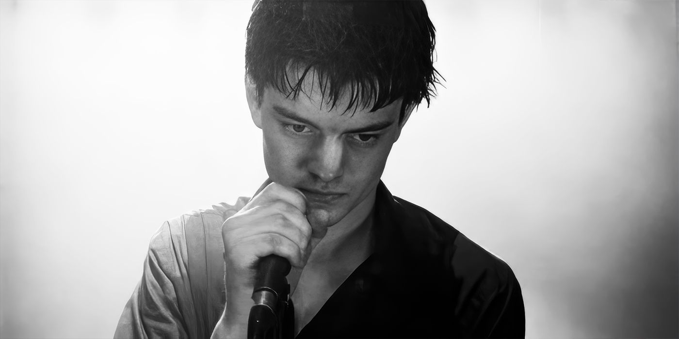 Sam Riley as Ian Curtis performing in Control