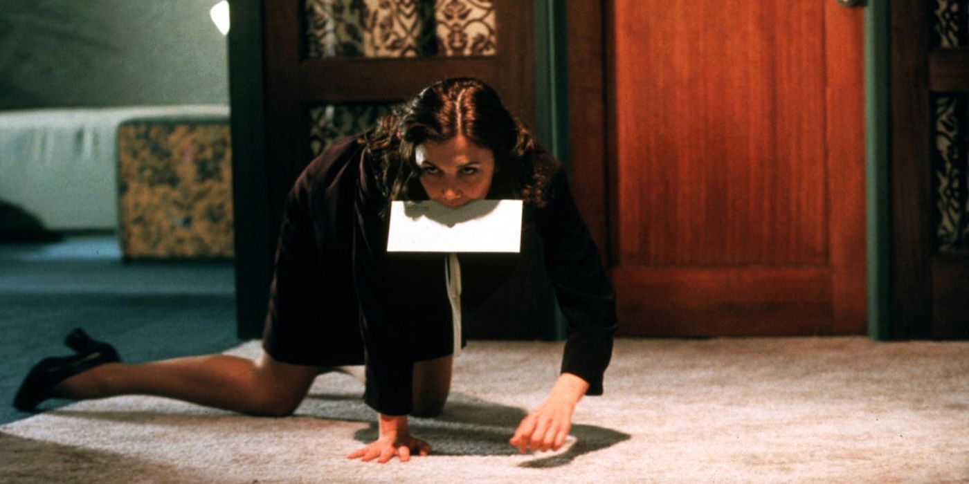 Maggie Gyllenhaal as Lee Holloway in Secretary