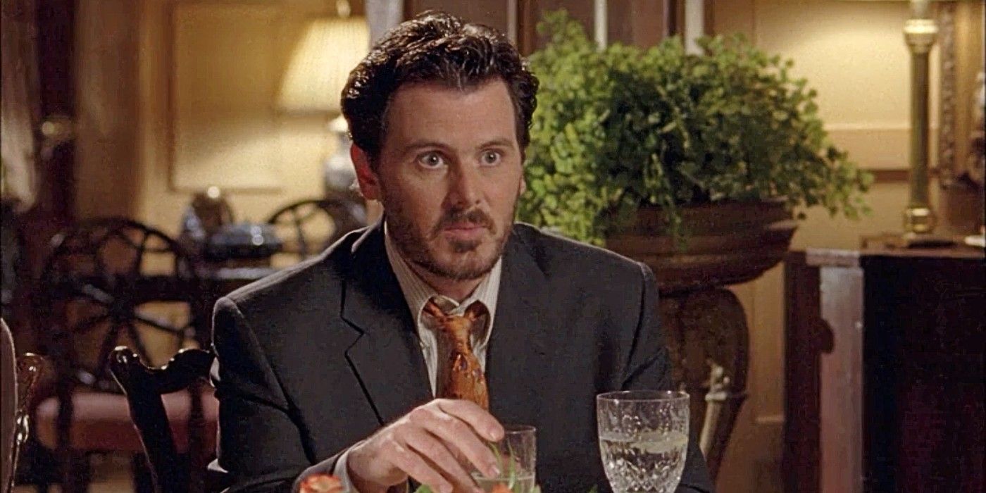 Jason Stiles sitting at the dining table in Gilmore Girls Season 4.