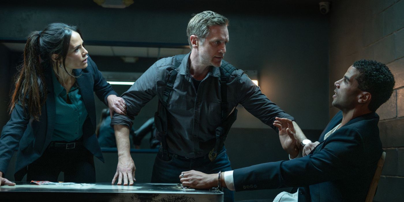 Jordana Brewster, Devon Sawa, and Mason Gooding in a police interrogation room in Heart Eyes.