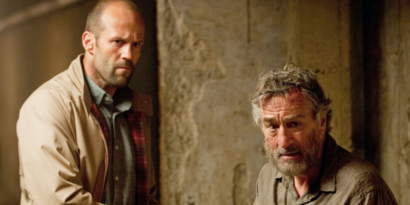 Jason Statham and a bearded Rober De Niro looking away in Killer Elite.