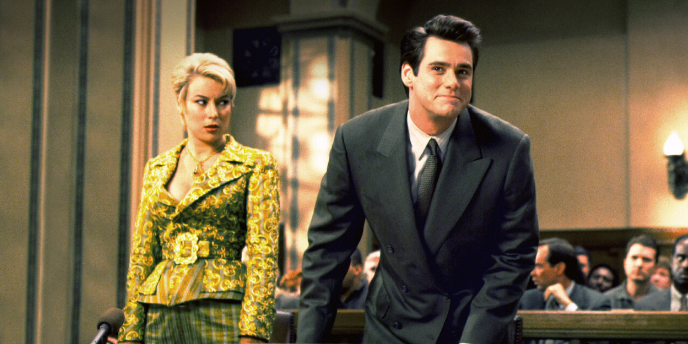 Jim carrey and Jennifer tilly stand on a courtroom