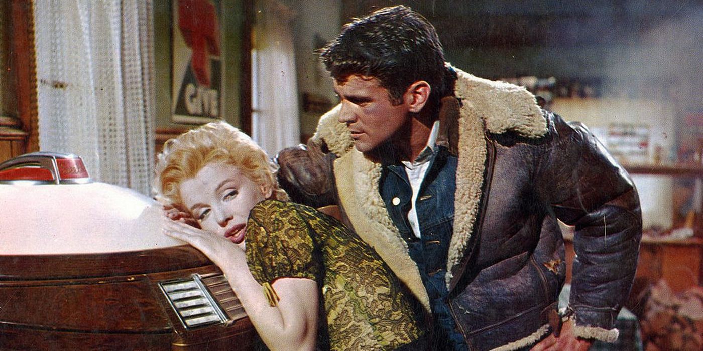 Don Murray leaning on top of Marilyn Monroe in a diner in Bus Stop.