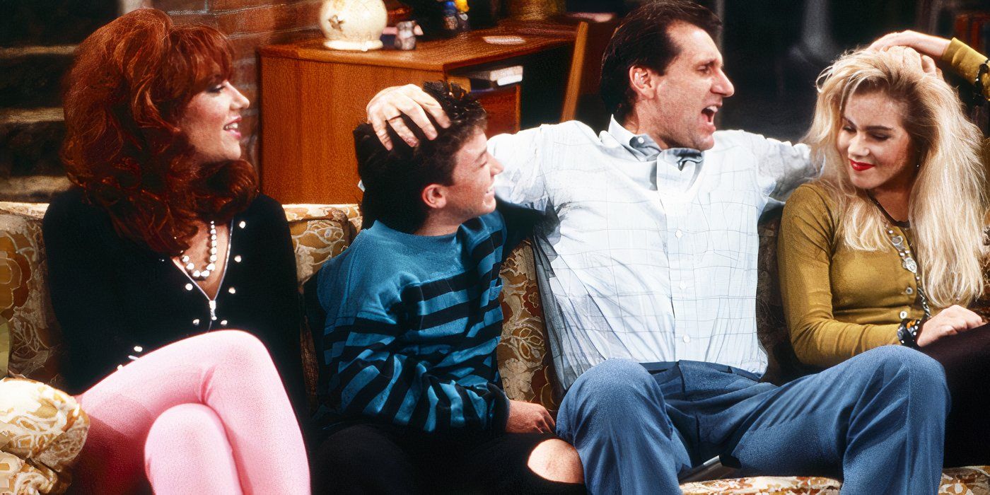 The Bundy family laughing together on a couch in Married...with Children.