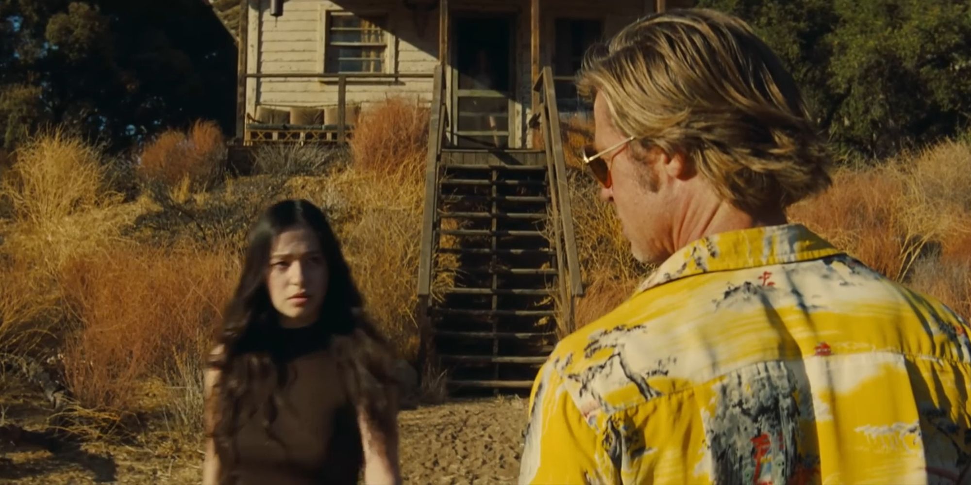 Mikey Madison and Brad Pitt in Once Upon A Time... In Hollywood