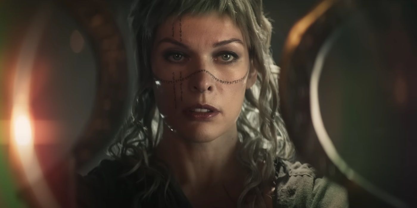Milla Jovovich, looking shocked, as Gray Alys in In the Lost Lands