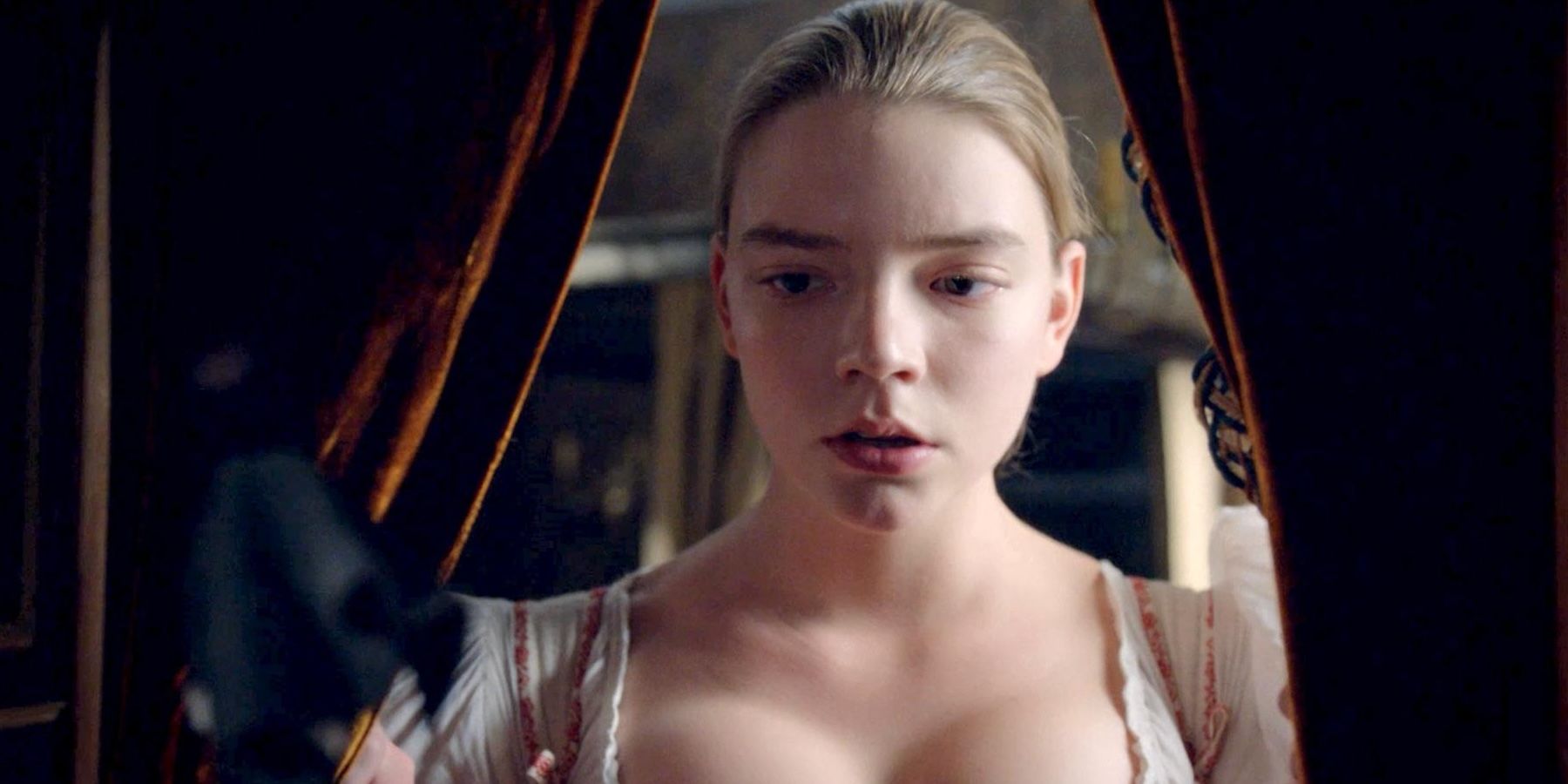 Nella (Anya Taylor-Joy) looks at her dollhouse in &lsquo;The Miniaturist.'