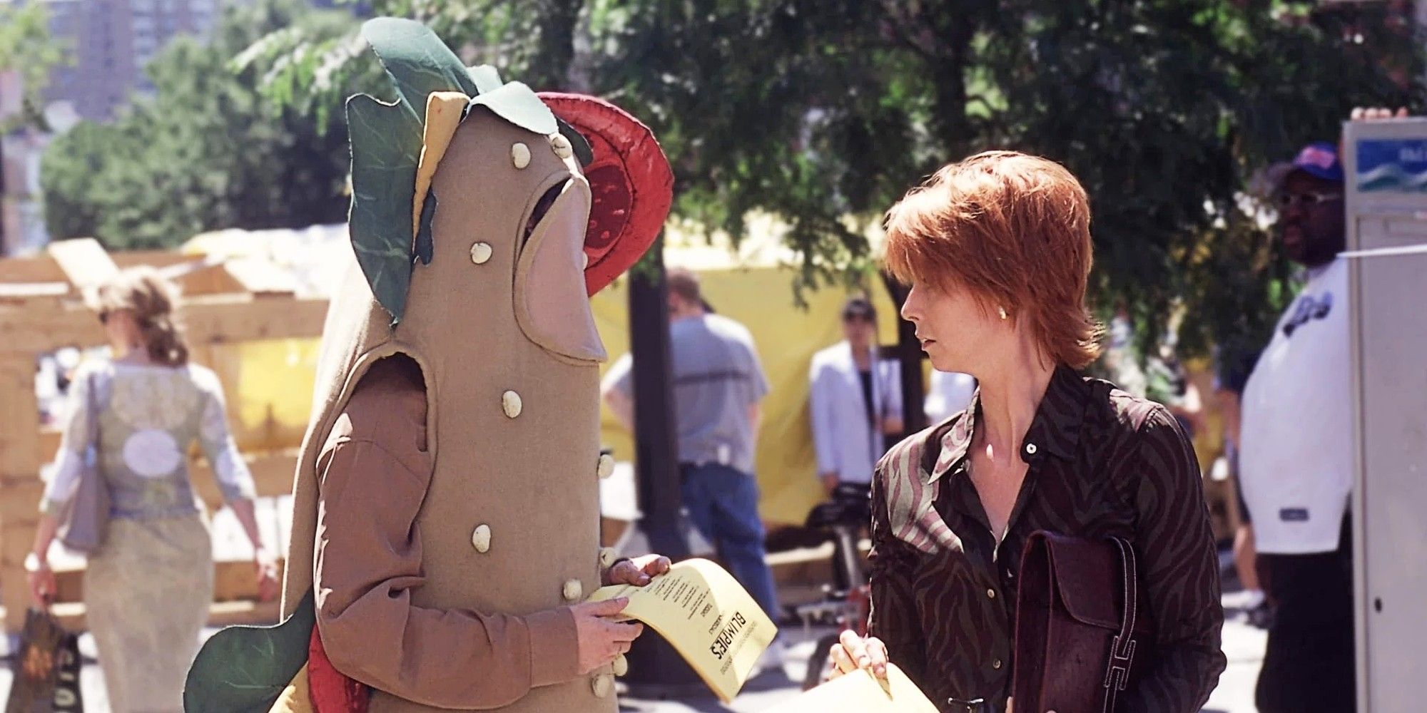 Miranda Hobbes speaking to a man in a sandwich costume in Sex and the City Season 3