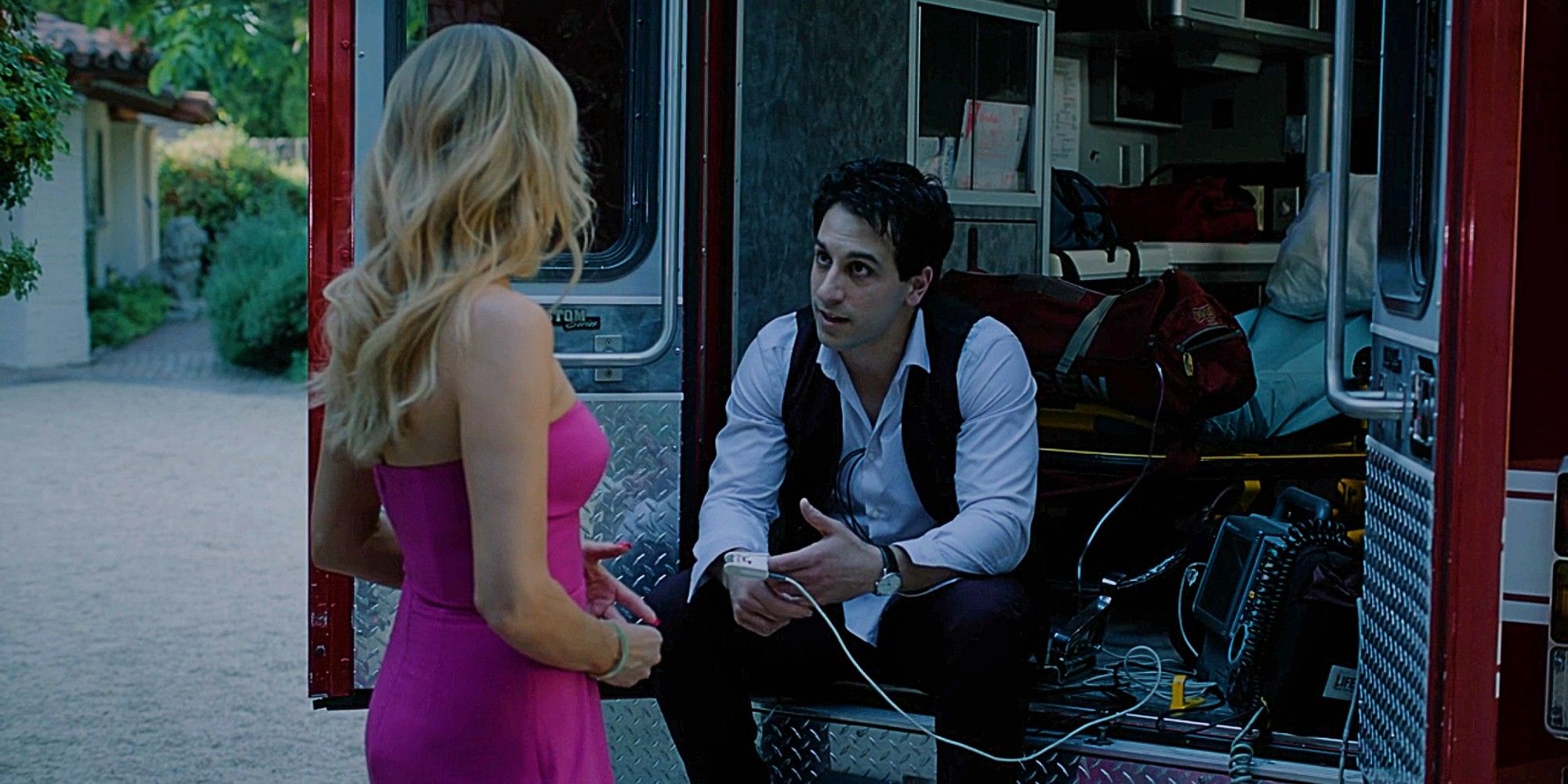 Oz talking to Morgan while sitting in an ambulance in the Season 1 finale of High Potential.