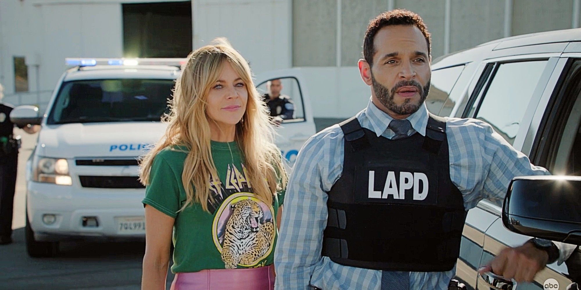 Morgan Gillory and Adam Karadec stand together while on duty in High Potential Season 1, Episode 11.