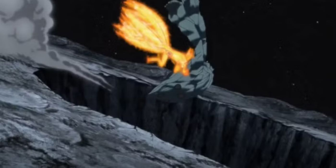 Giant glowing nine-tailed fox tackling a boulder on the moon in Naruto movie.