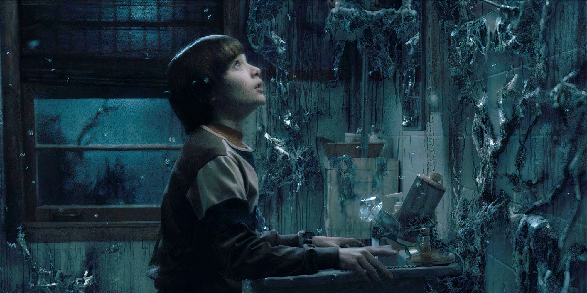 Noah Schnapp in Stranger Things standing in front of the mirror