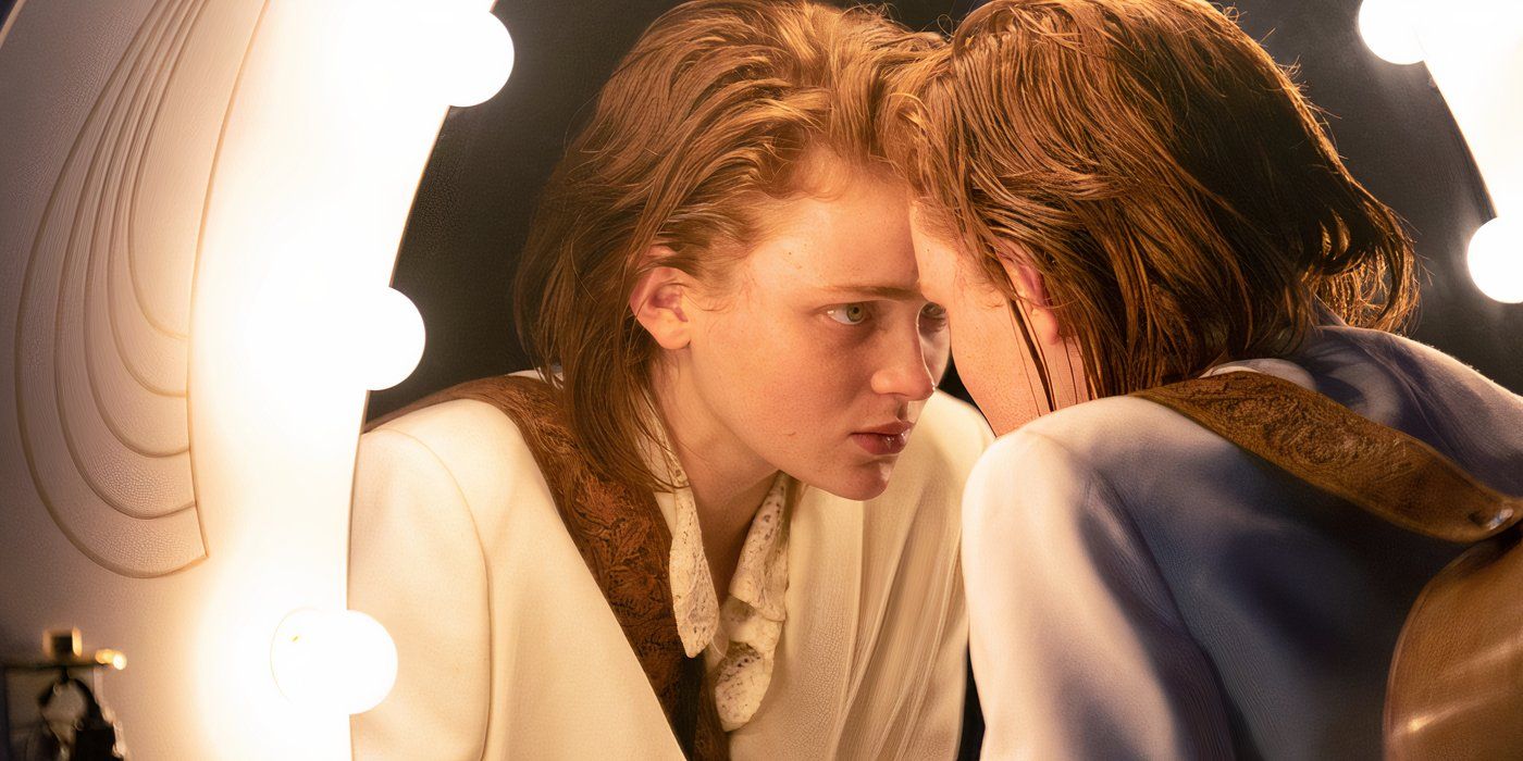 Sadie Sink as O'Dessa looking in the mirror in the film O'Dessa