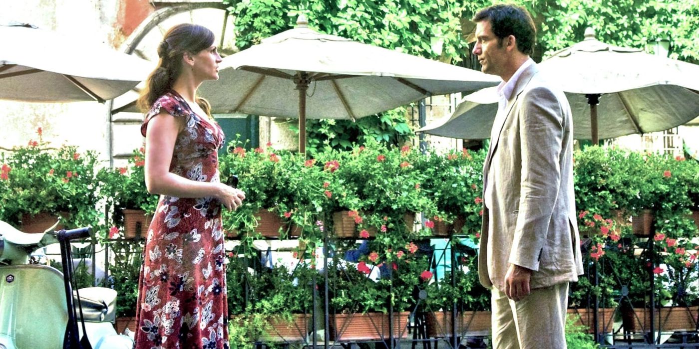 Claire (Roberts) and Ray (Owens) standing in Italy in Duplicity